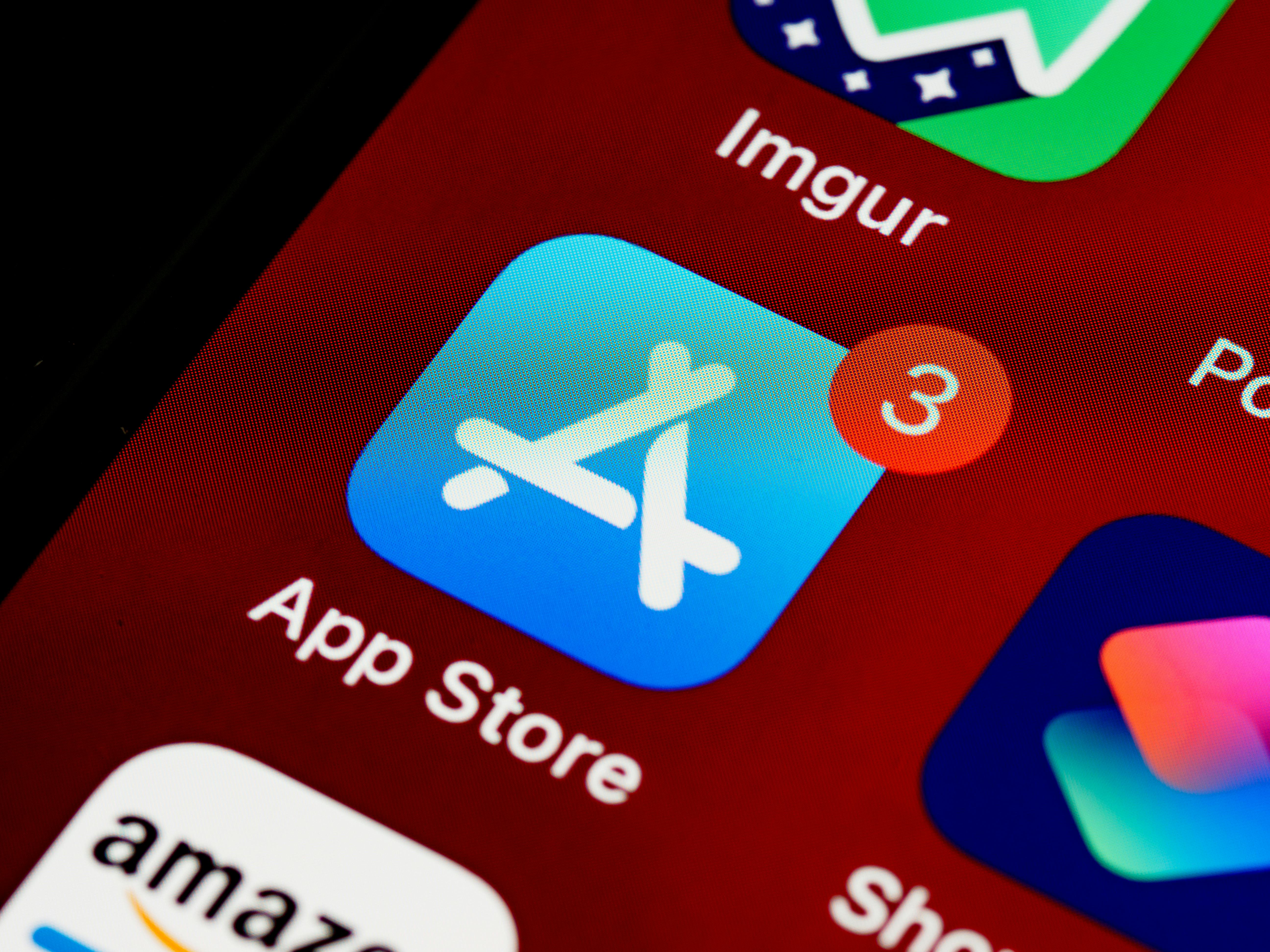 App Store icon on a smartphone screen